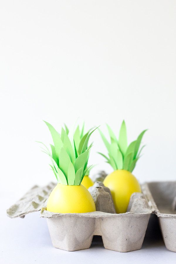 <p>Give your holiday tropical vibes with these painted pineapple eggs. Be sure to let your yellow paint completely dry before attaching the cardstock leaves.</p><p><strong>See more at <a href="https://studiodiy.com/diy-pineapple-easter-eggs/">Studio DIY!</a>.</strong></p>