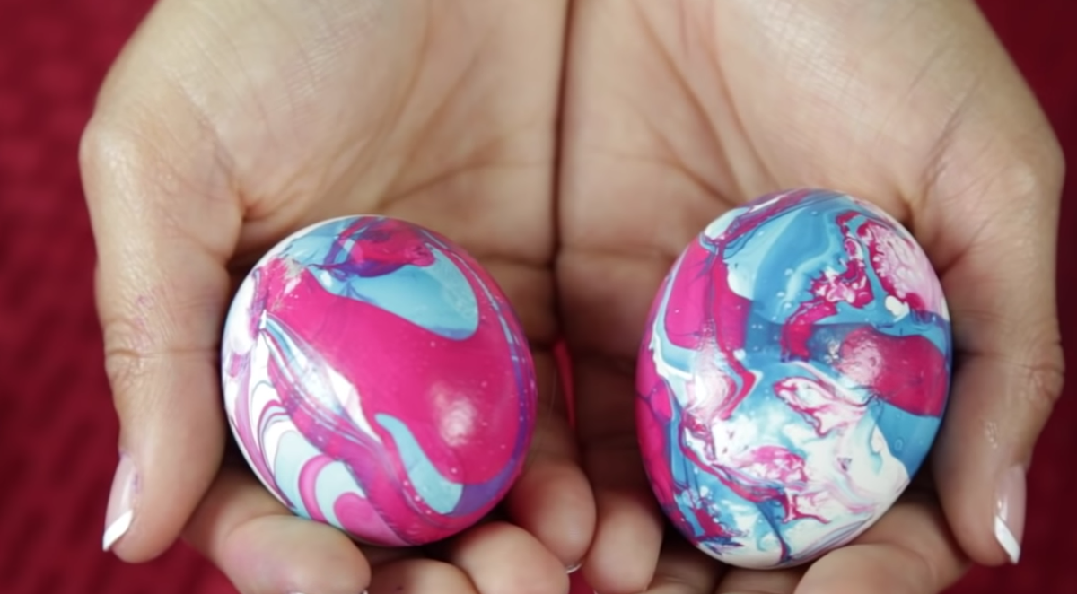 <p>To create this colorful marbled egg, simply pour different nail polishes into a bowl of warm water, use a toothpick to mix the colors into a swirly design, and dip your eggs into the colorful water. Genius!</p><p><strong>See more at <a href="https://makeit-loveit.com/easter-eggs-3-fun-ways-to-decorate-your-easter-eggs">Make It & Love It</a>. </strong></p>