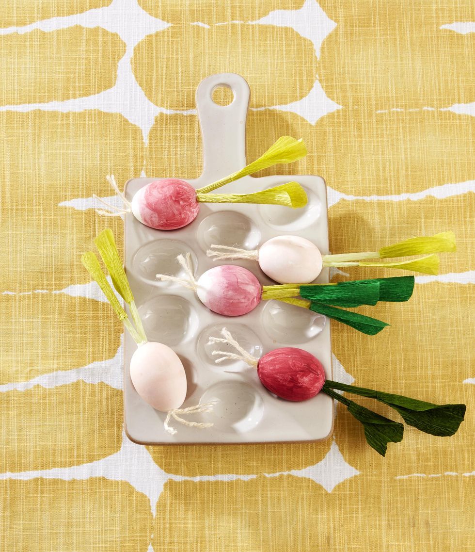 <p>These <em>a</em><em>lmost</em> delicious-looking eggs (don't eat them, for goodness' sake!) would be such a fun addition to any Easter table. To make them, paint a blown-out white egg pink, then create roots by attaching pieces of twine and crepe paper to the bottom of each.</p><p><strong>Get the tutorial at <a href="https://www.countryliving.com/diy-crafts/g26518694/egg-painting-techniques/?slide=4">Country Living</a>.</strong></p>