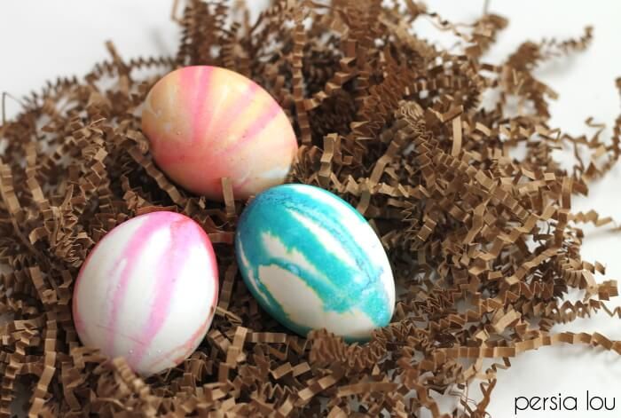 <p>To create this cool watercolor effect, dip your egg in water, add paint to the top of the egg, and allow the color to run down the sides. So simple, yet so pretty! </p><p><strong>See more at <a href="https://persialou.com/watercolor-drip-dyed-easter-eggs/">Persia Lou</a>.</strong></p>