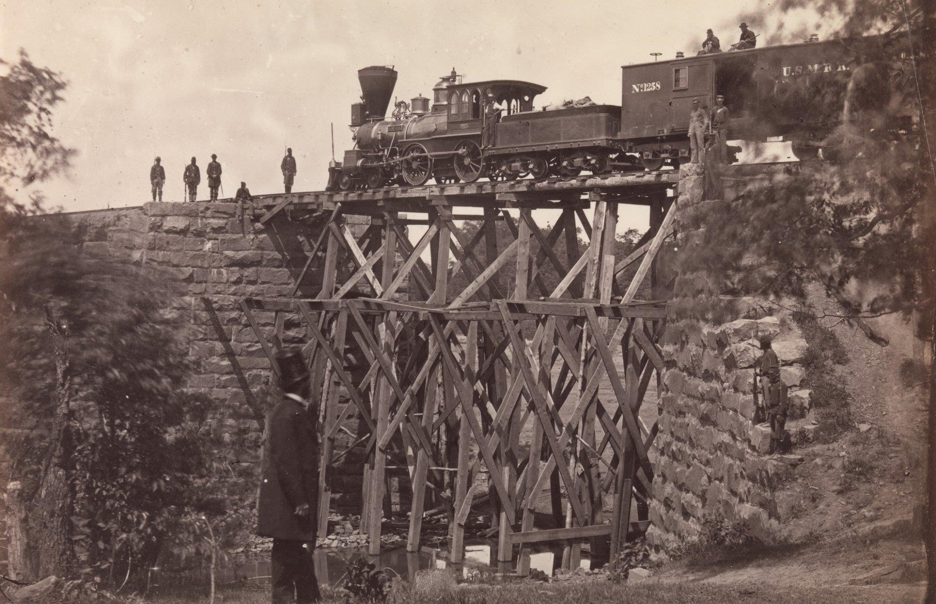 <p>By the end of the Civil War America's railways, like the rest of the nation, required reconstruction. The South was particularly badly affected, partly because Confederate saboteurs destroyed their own lines to try to halt the Union advance. Repairs were often hastily carried out by military engineers, as with this bridge on the Orange and Alexandria Railroad. Photographed in 1865, the bridge is just about being supported by a rudimentary-looking patch. Thanks to this sort of work, lines could sometimes be back up and running within hours of an enemy attack.</p>