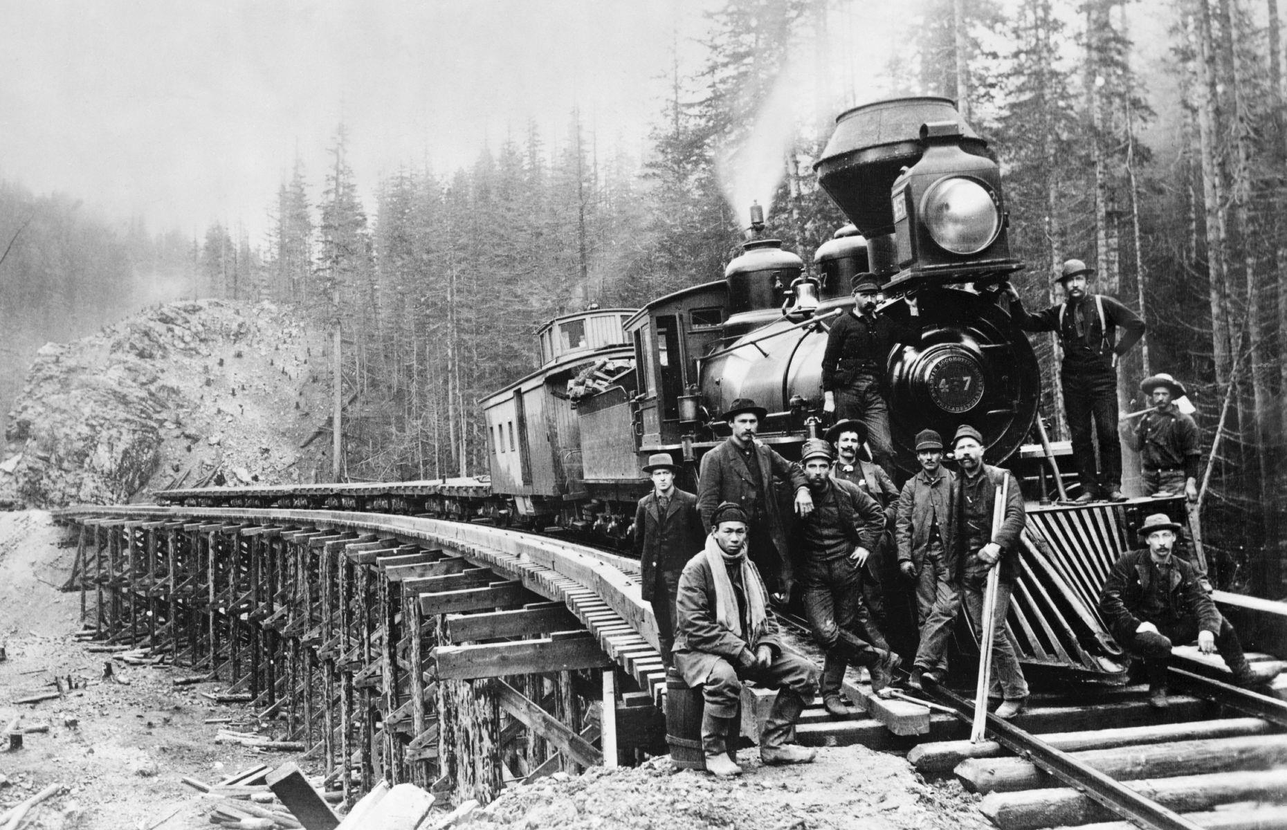 <p>By the 1880s, industrialists like Jay Gould, Cornelius Vanderbilt and JP Morgan made fortunes by sinking vast sums of money into railroads and slowly gaining a monopoly on rail travel. Small, regional lines were consolidated into giant rail empires headed by men whose astonishing wealth and sometimes-questionable business practices meant they became known as 'robber barons.' Lines continued to expand as money was pumped into new track and infrastructure, like the new bridge crossing over the Green River in Washington, pictured here in 1885.</p>