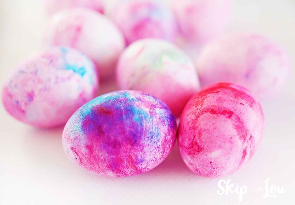 <p>This alternative egg-dyeing idea involves using shaving cream and food coloring to achieve the beautiful tie-dye effect you see here. You can also use Cool Whip for an edible version!</p><p><strong>See more at <a href="https://www.skiptomylou.org/shaving-cream-eggs/">Skip to My Lou</a>. </strong></p>