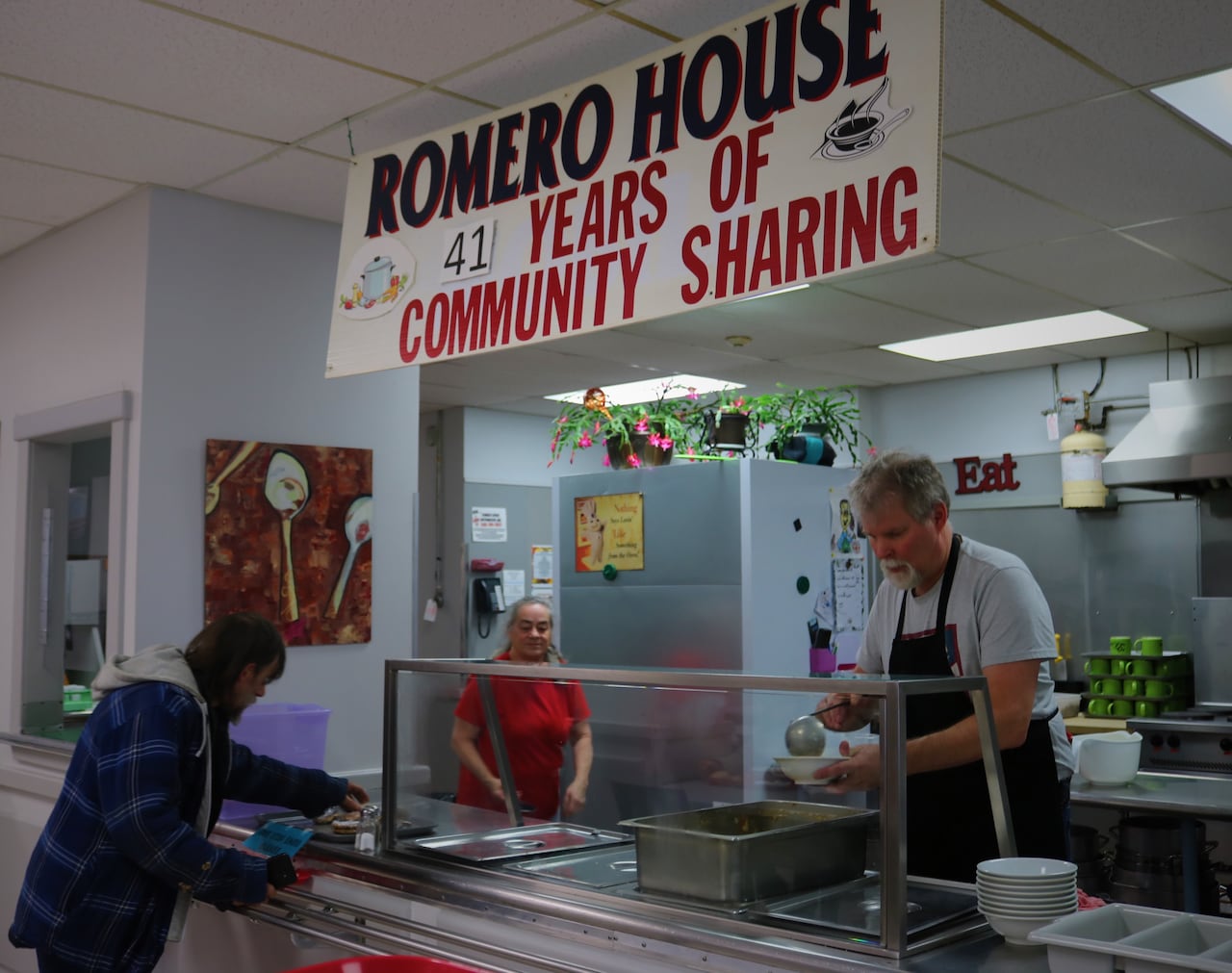 don't call soup kitchen a 'band-aid,' says romero house director. it's a 'tourniquet'