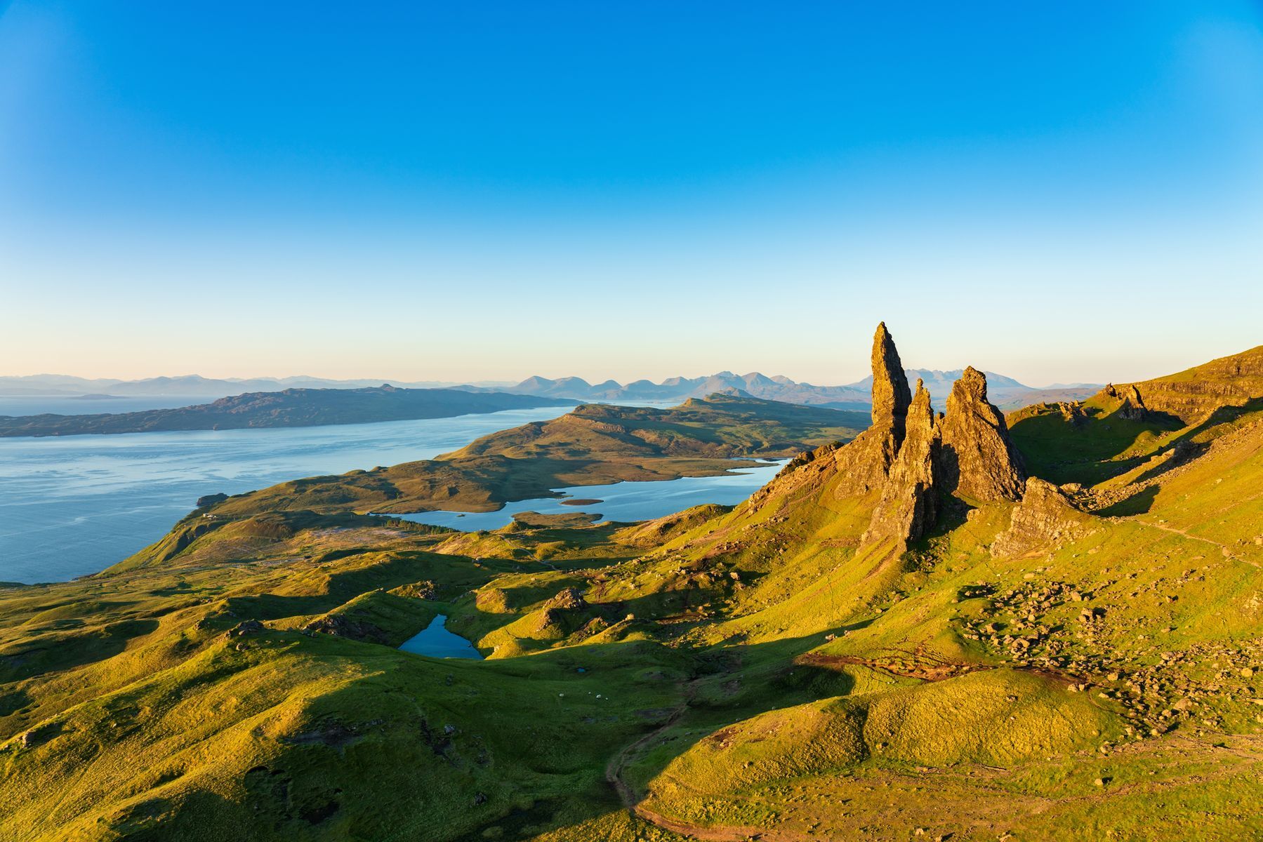 <p>The <a href="https://www.visitscotland.com/info/towns-villages/skye-p245091" class="CMY_Link CMY_Valid" rel="noreferrer noopener">Isle of Skye</a>, one of Scotland’s Inner Hebrides, seems straight out of a fairy tale. The spectacular Quiraing cliffs and lush green valleys will charm nature lovers, while the Dunvegan and Eilean Donan castles are sure to delight history buffs. Also visit the Fairy Pools, magical waters of Sligachan, Cuillin Mountains, and Kilt Rock for breathtaking views of nature.</p>