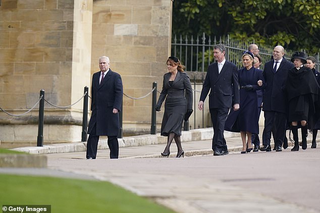 prince andrew leads the pack at king constantine of greece's memorial service: duke of york grins as he greets royal guests and takes them to their seats in rare public appearance alongside ex-wife fergie