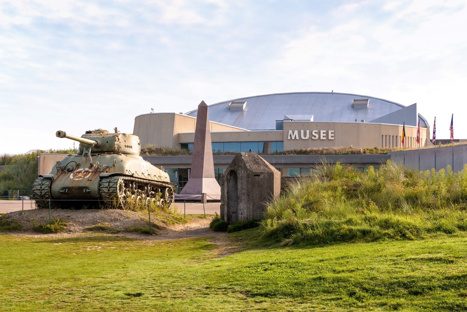 <p><span>Utah Beach, with its expansive sands and gentle dunes, belies the intense historical significance of this location. The Utah Beach Museum, situated at the very site of the D-Day landings, offers a poignant reminder of this beach’s pivotal role in World War II.</span></p> <p><span>The museum’s collection is comprehensive, featuring an array of military vehicles, personal artifacts, and immersive dioramas that vividly recount the events of June 6, 1944. As you explore the exhibits, you’ll gain a deeper understanding of the planning and execution of the landings and the immense challenges faced by the Allied forces.</span></p> <p><span>The museum also pays tribute to the airborne operations crucial to the success of the landings with detailed accounts and displays. Stepping outside onto Utah Beach, the contrast between the peaceful present and its turbulent past becomes strikingly evident, offering a moment for reflection on the sacrifices made on these shores.</span></p> <p><b>Insider’s Tip: </b><span>Look out for the original B-26 Marauder aircraft displayed at the museum, a rare piece of history.</span></p>