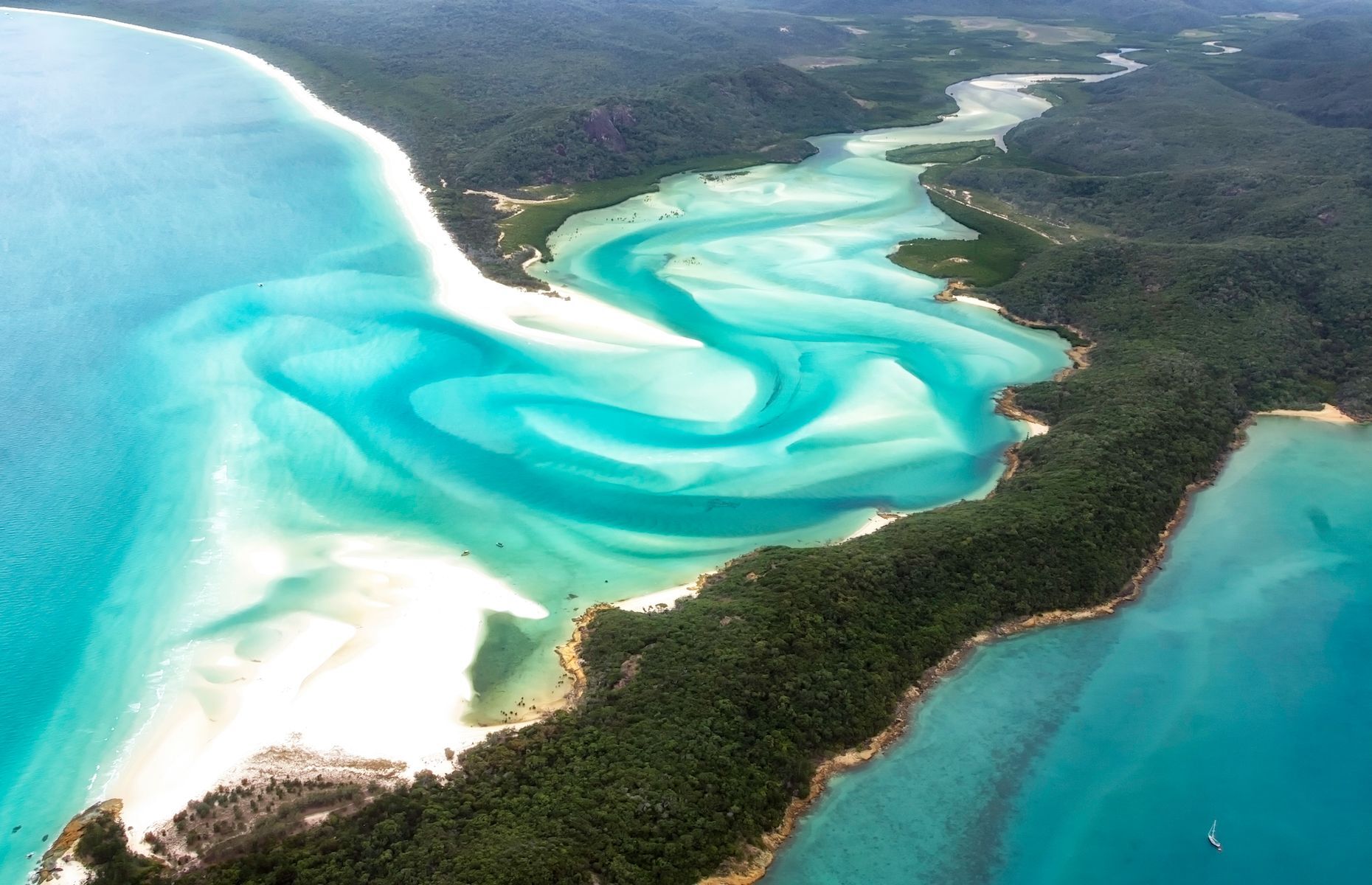 <p>Located in Australia’s Whitsunday archipelago, <a href="https://www.hamiltonisland.com.au/en" class="CMY_Link CMY_Valid" rel="noreferrer noopener">Hamilton</a> is a tropical paradise famous for its aquamarine waters and white sandy beaches. Visitors can indulge in a multitude of water activities, such as diving at the Great Barrier Reef and swimming in Hill Inlet’s natural pools. Meanwhile, hikers can explore the island’s interior and enjoy breathtaking panoramas from Passage Peak and other lookouts.</p>