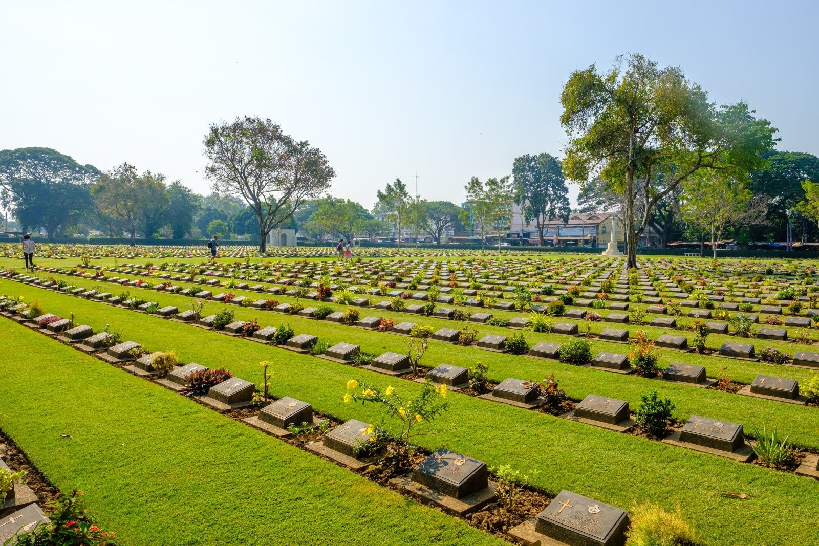 <p><span>In Kanchanaburi War Cemetery, you’ll find a place of profound peace and respect. This meticulously maintained cemetery is the final resting place for over 6,000 Allied prisoners of war who lost their lives during the construction of the Death Railway. Each headstone tells a story of bravery and hardship, offering a space for reflection and remembrance.</span></p> <p><span>The cemetery, with its rows of white gravestones set against a backdrop of manicured lawns and tropical plants, starkly contrasts the turbulent history it represents. Pay your respects and understand the human cost of war and the enduring spirit of those who endured unimaginable hardships.</span></p> <p><b>Insider’s Tip: </b><span>Visit during the early morning or late afternoon for a quieter experience. </span></p> <p><b>When To Travel: </b><span>Open year-round, but the cooler months are more comfortable.</span></p> <p><b>How To Get There: </b><span>Located in Kanchanaburi town, it’s easily accessible on foot or by local transport.</span></p>
