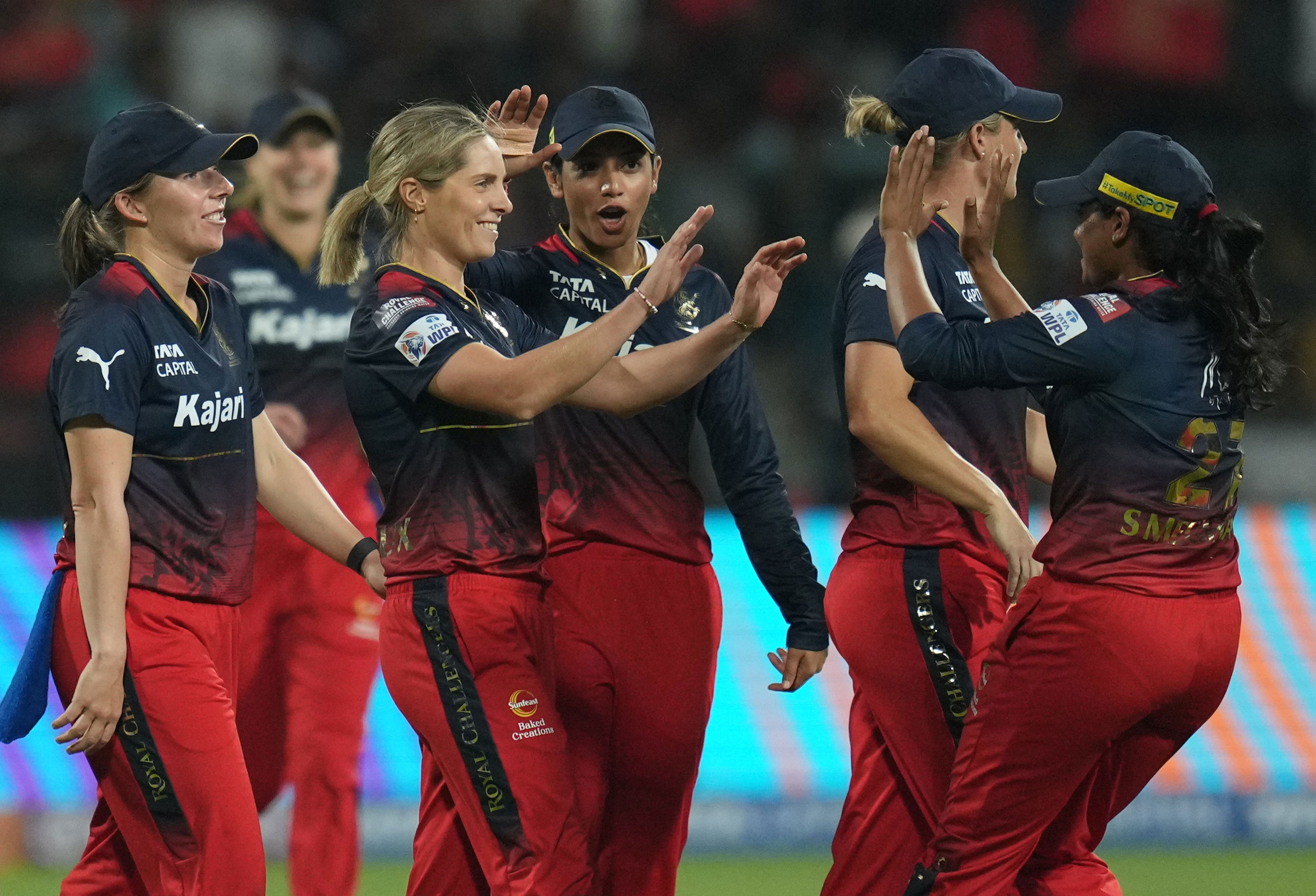 disciplined rcb bowlers restrict giants to meagre 107/7