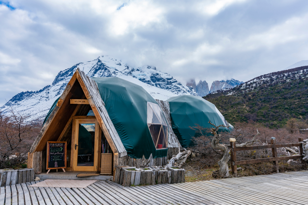 <p>This ecolodge was the first hotel in Patagonia that features a certified Environmental Management System. It also offers incredible views of the Torres del Paine granite peaks. </p>  <p>The design of the camp was <strong>i</strong><strong>nspired by the Kaweskars,</strong> a nomadic Indigenous group that once lived in the region.</p>