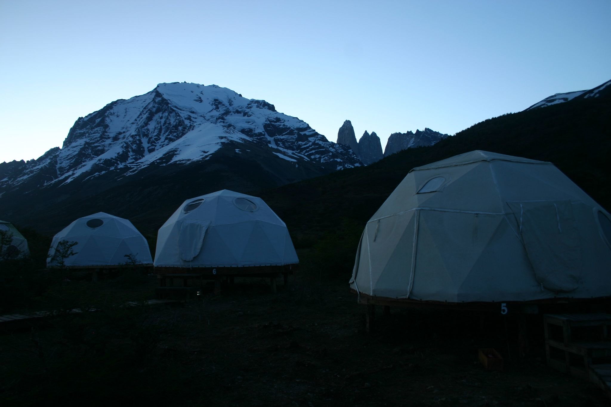 <p>Visitors stay in geodesic dome suites, that feature en suite bathrooms, wood stoves, and open terraces that provide breathtaking views of the landscape. </p>  <p>The camp is<strong> designed to be carbon-neautral</strong>, and all electricity is provided via photovoltaic panels and micro-hydro turbines. They also have a strict recycling program and use composting toilets.</p>