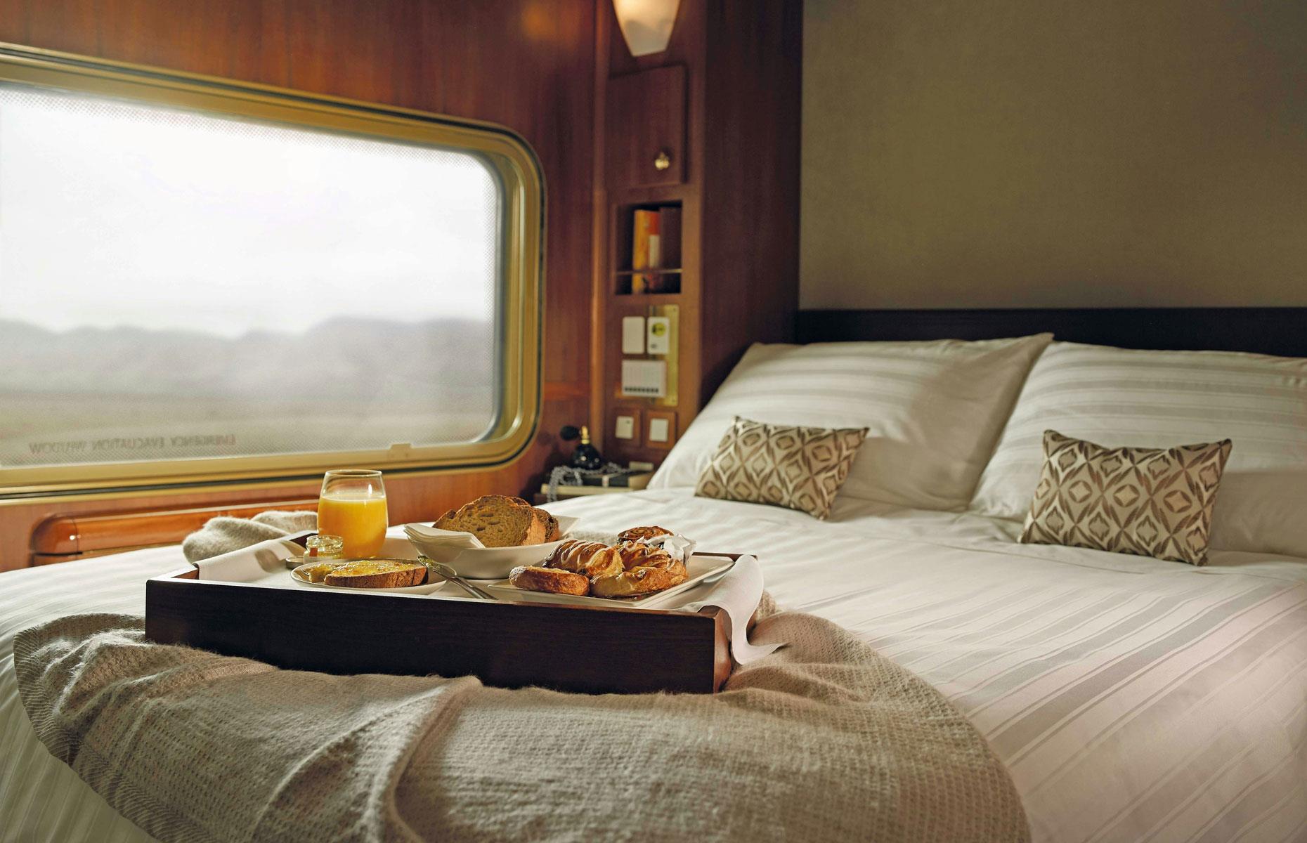 <p>Platinum passengers get dibs on the train's best ensuite cabins and have access to the Platinum Club, an exclusive bar carriage. There, they can sip on Bollinger champagne to their hearts' content and enjoy gourmet meals in the Art Deco-style Queen Adelaide Restaurant.</p>  <p>The Platinum fare includes several excursions, including a "spectacular dinner under the stars" in Alice Springs and a tour of the subterranean opal mining town of Coober Pedy.</p>