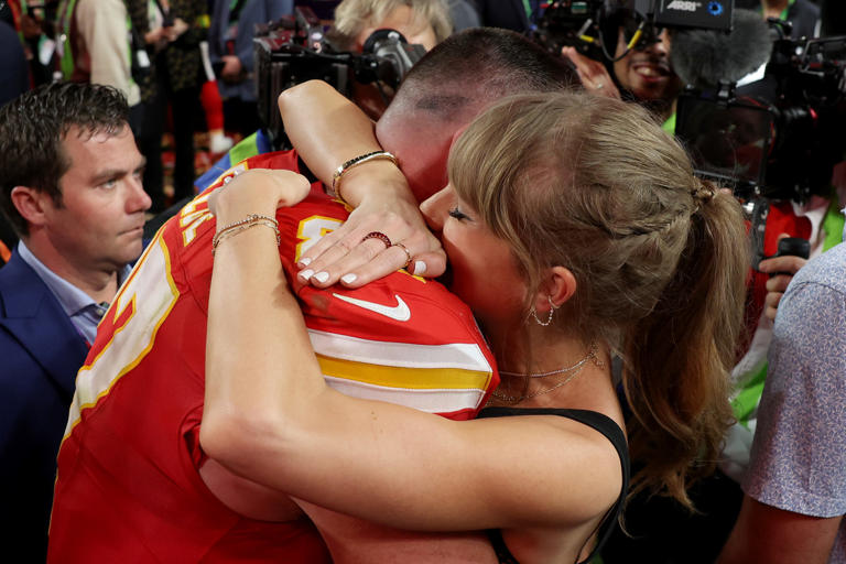 LAS VEGAS, NEVADA - FEBRUARY 11: Travis Kelce #87 of the Kansas City Chiefs hugs Taylor Swift after defeating the San Francisco 49ers 25-22 during Super Bowl LVIII at Allegiant Stadium on February 11, 2024 in Las Vegas, Nevada. (Photo by Ezra Shaw/Getty Images) Ezra Shaw/Getty Images