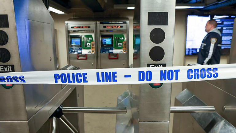 Police walk through a subway station in February 2024 after a shooting. Pic: AP