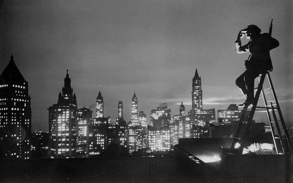 <p>Featured here is roof spotter Benjamin Franklin as he takes a break and admires the budding New York skyline at the end of a long day of work. Not only has the city evolved over the decades, but clearly so have safety procedures. </p> <p>It doesn't seem like Franklin is wearing any safety gear at all that might prevent him from a long fall to the bottom of the street. Little did he know this snapshot would become a famous picture one day either! </p>