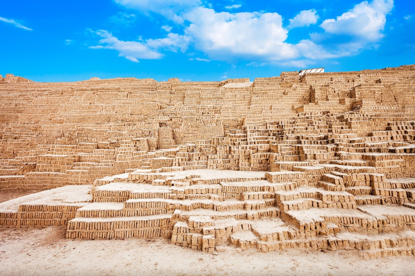 <p><span>In Lima, Peru, discover Huaca Pucllana, a pre-Columbian pyramid made entirely of adobe bricks. Amidst the urban landscape, this pyramid is a stark reminder of the region’s rich pre-Incan history.</span></p> <p><b>Traveler’s Insight: </b><span>Take a guided tour at night when the pyramid is beautifully illuminated, offering a unique perspective to its magic.</span></p> <p><b>Getting There: </b><span>Huaca Pucllana is in the Miraflores district of Lima, easily accessible by taxi or public transport from anywhere in the city.</span></p> <p><b>Things to Consider: </b><span>The site is in an urban area, so it’s a convenient visit. Guided tours are available and recommended to understand the site’s history better. The night tour offers a different perspective with the pyramid lit up.</span></p>