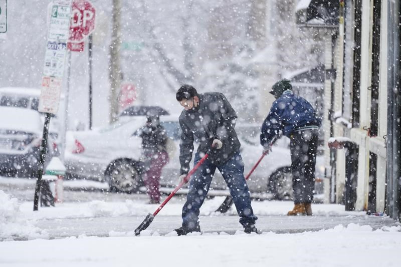 winter storm hits northeast, causing difficult driving, closed schools and canceled flights
