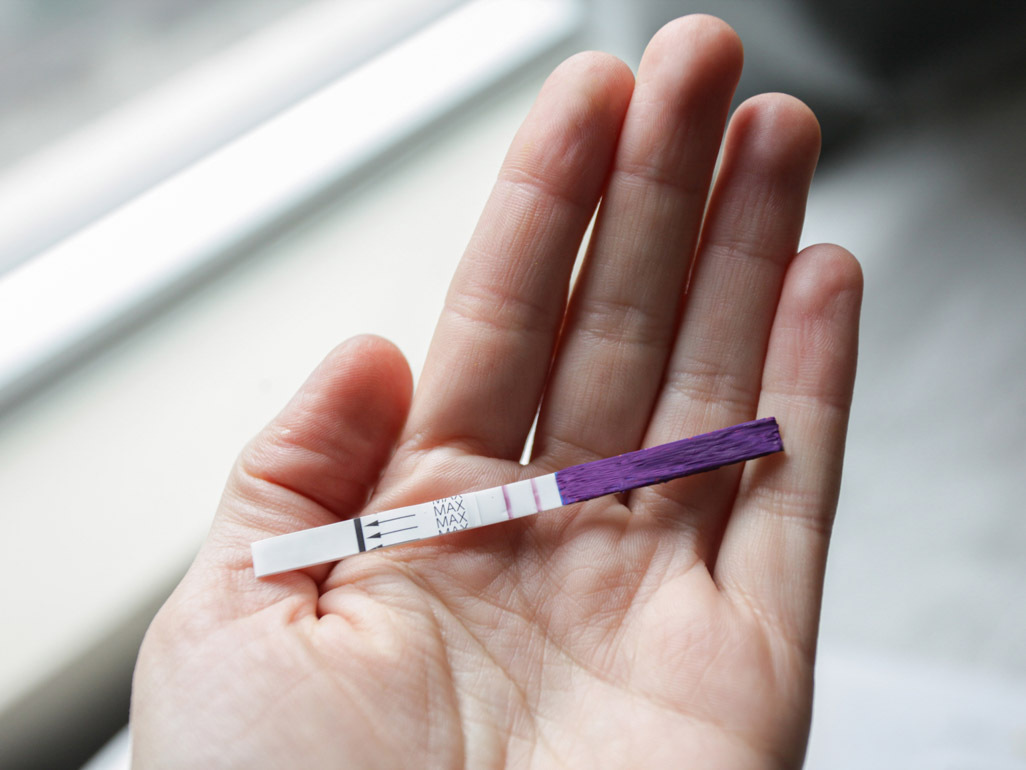 Can An Ovulation Test Detect Pregnancy? Here's Why It's Complicated