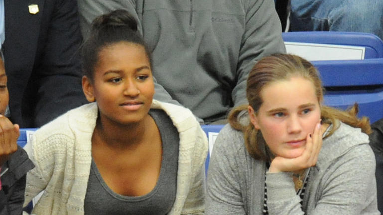 Maisy Biden and Sasha Obama at women's college basketball game