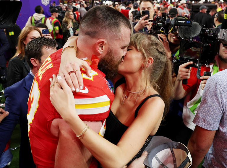 The pair locked lips on the field after Travis led the Kansas City Chiefs to victory on Feb. 11, 2024 in Las Vegas.