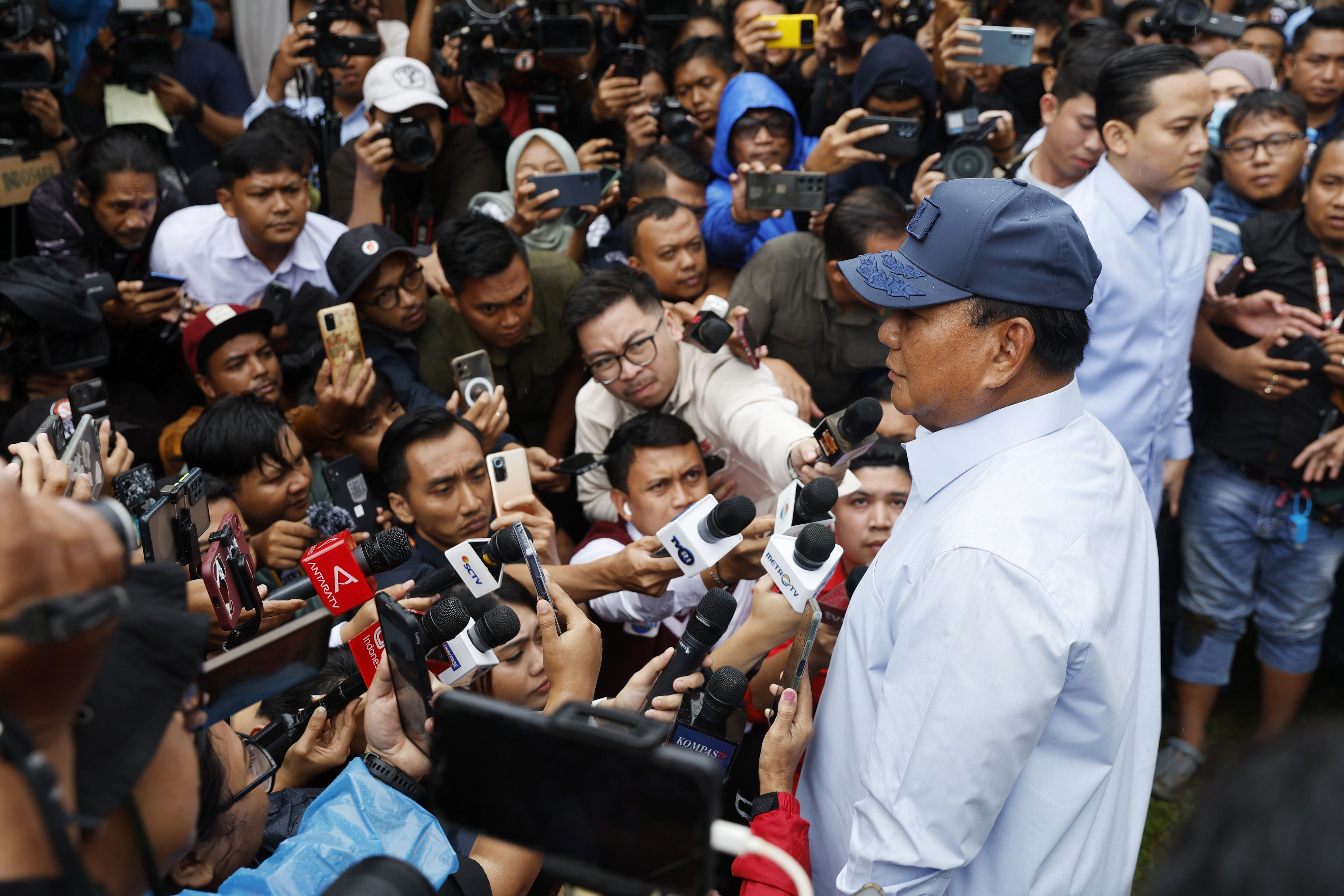 indonesia election 2024: defence minister prabowo subianto leads in early unofficial count