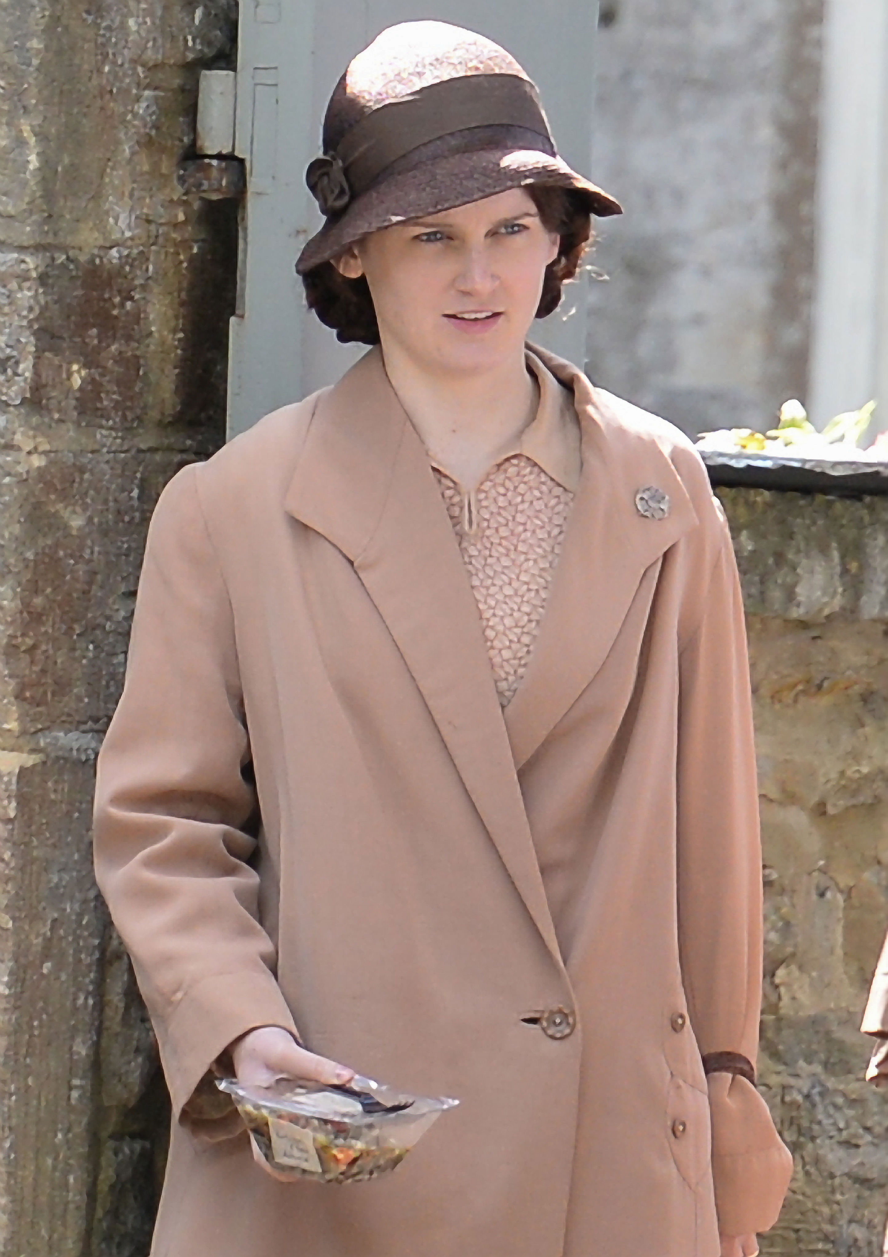 <p>Despite their devotion to the Crawleys, the downstairs servants do shed their uniforms once in a while! Here's how Daisy Mason (played by Sophie McShera) looked off-duty while filming "Downton Abbey" in Oxfordshire, England, in 2014. "As soon as you get to dress [the servants] in civilian clothes, it's a lovely challenge because you get to add that extra layer to their personality," costume designer Anna Mary Scott Robbins told <a href="https://fashionista.com/2015/02/downton-abbey-costume-designer-anna-robbins">Fashionista</a>. "You're able to add detailing that gives them that extra dimension."</p>