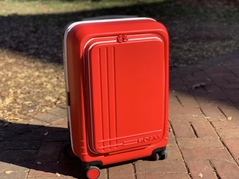 The ROAM Carry-On Front Pocket in red.