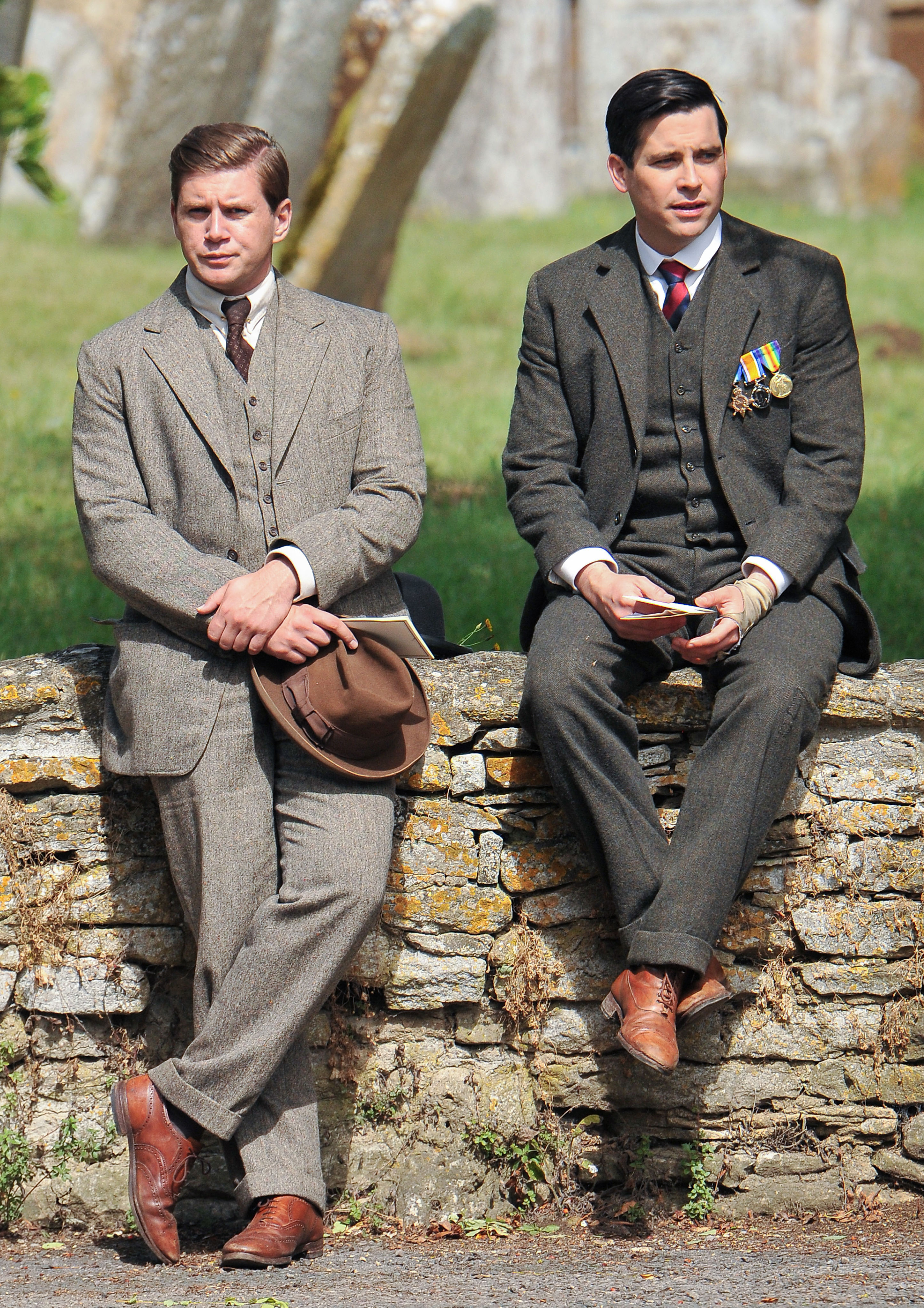 <p>The men's looks on "Downton Abbey" are period-perfect too. Here's Allen Leech (as chauffeur-turned-Crawley son-in-law Tom Branson) and Rob James-Collier (as servant Thomas Barrow out of uniform) on the set of the show in 2014.</p>