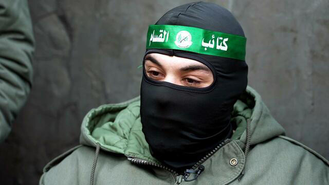 Masks, guns and nerves: Interviewing a Hamas commander in the West Bank