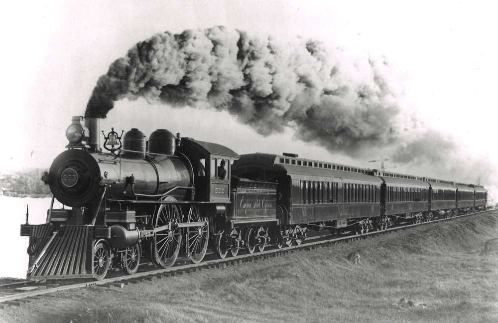 <p>On May 10, 1893, the New York Central's <em>Empire Express </em>hurtled between Batavia and Buffalo, N.Y., at a blistering speed of 112½ mph. It was a world speed record … sort of. The claimed top speed was not recorded and verified by any scientific means. There are sources that claim the speed recorder on No. 999 never went beyond 86 mph. Other sources indicate the top speed was reported by an "unreliable" newspaper journalist.</p> <p>Legitimacy of the record aside, No. 999, a specially-built 4-4-0, was fast. Whatever the top speed was on May 10, 1893, especially if it did reach the 100-mph mark, No. 999 became the fastest propelled vehicle in world history to date. Previously, the NYC had used locomotives with 70-inch driving wheels on the route between New York and Buffalo. The new <em>Empire State Express</em> was pulled by engines sporting 78-inch drivers. For the speed run, No. 999 was constructed with 86-inch driving wheels, making speed at and above the century mark possible.</p> <p>The speed run was also a grand publicity stunt. George Henry Daniels, NYC general passenger agent, was looking for ways to draw attention to the <em>Empire Express. </em>He was after some free publicity. As a result of the May 10 trip, the U.S. Post Office issued a two-cent postage stamp featuring the train and locomotive. Talk about publicity - the Bureau of Engraving and Printing ran 209,759,700 of the "Fast Express" stamps beginning May 1, 1901.</p>