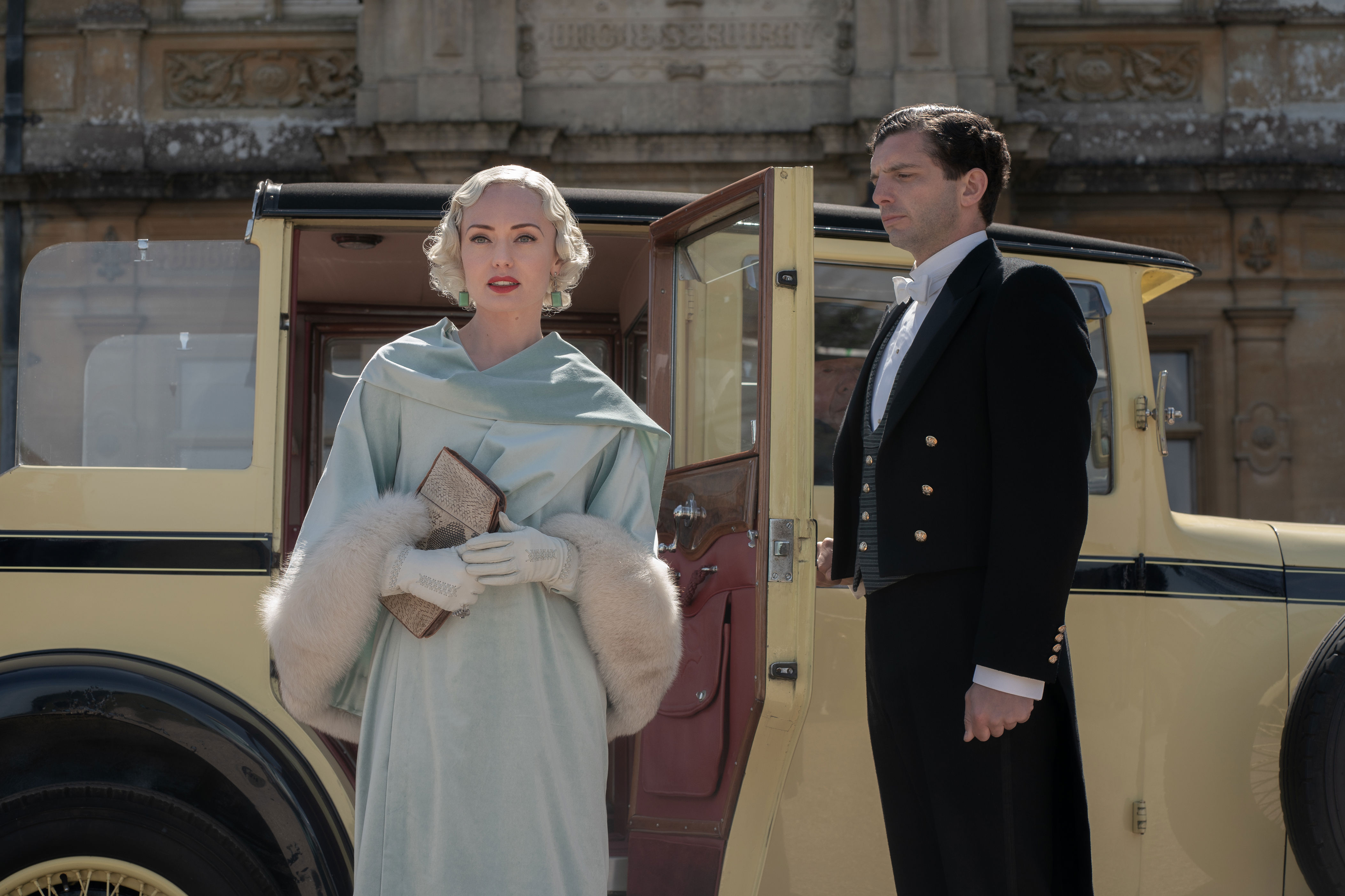 <p>In the 2022 film "Downton Abbey: A New Era," Laura Haddock -- who played new character Myrna Dalgleish, a silent movie star -- stunned in a white fur-trimmed ice blue confection as footman Andy, played by Michael C. Fox, opened her car door.</p>