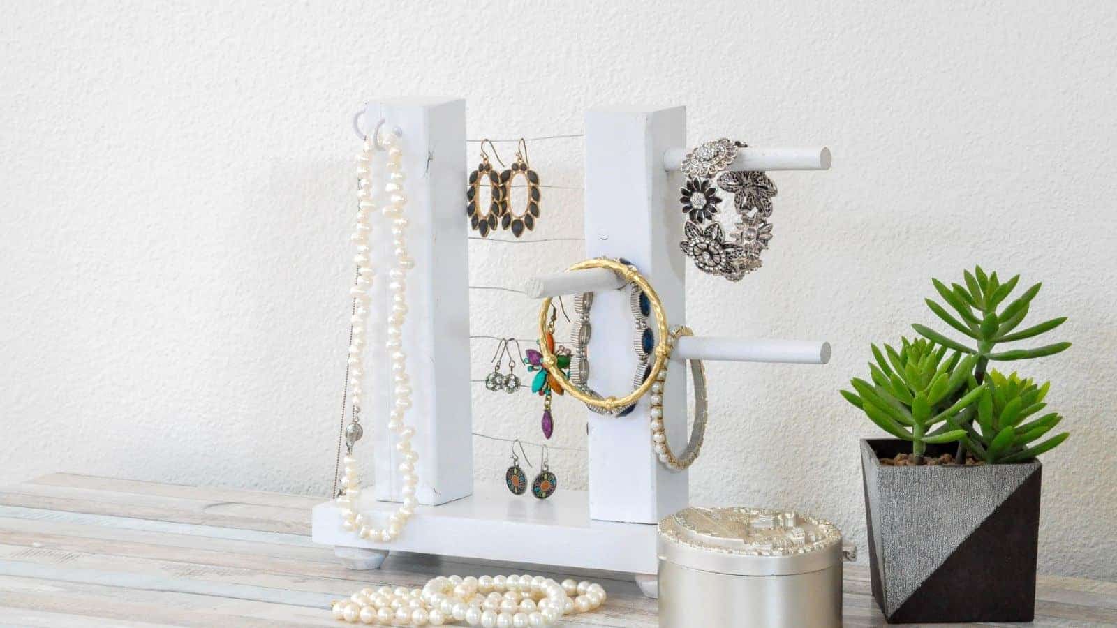 <p>Organize your jewelry and display it on your dresser or tabletop. It’s simple to make from scrap wood and a few other materials. This beginner-friendly woodworking project makes a great gift! <a href="https://www.anikasdiylife.com/diy-table-top-jewelry-holder/">See how to make this jewelry holder.</a></p>