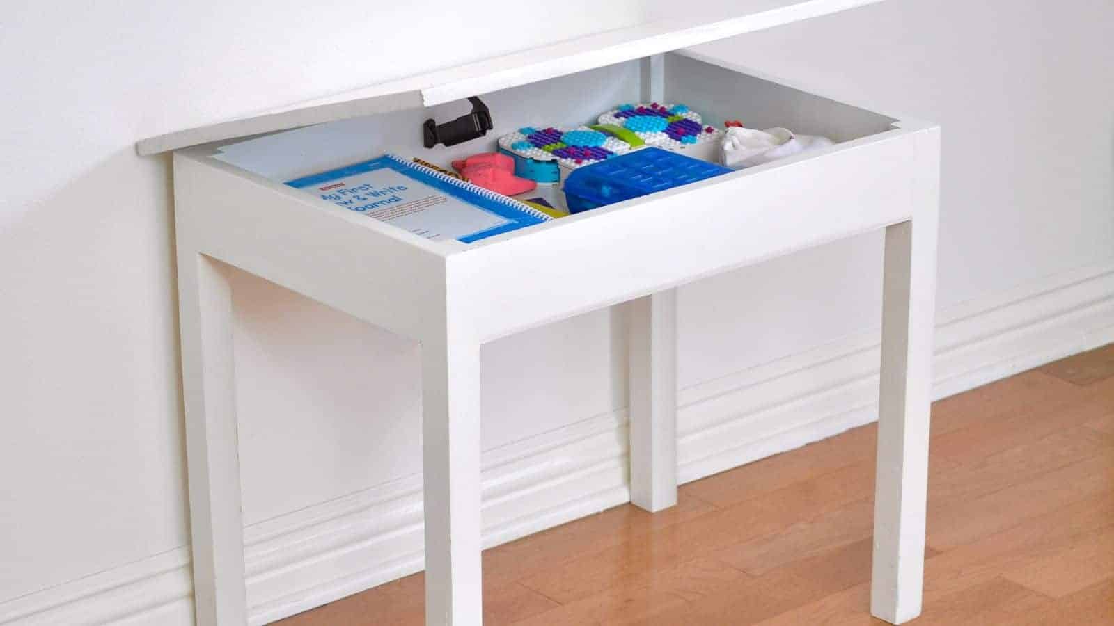 <p>Having their own space to do homework and be creative is key to a child’s development. This DIY kid’s table even has hidden storage, so all their papers and supplies can be hidden away when they’re done. The soft-close hinge makes it safe for little fingers. <a href="https://www.anikasdiylife.com/diy-kids-table-with-storage/">Make this easy beginner woodworking project!</a></p>