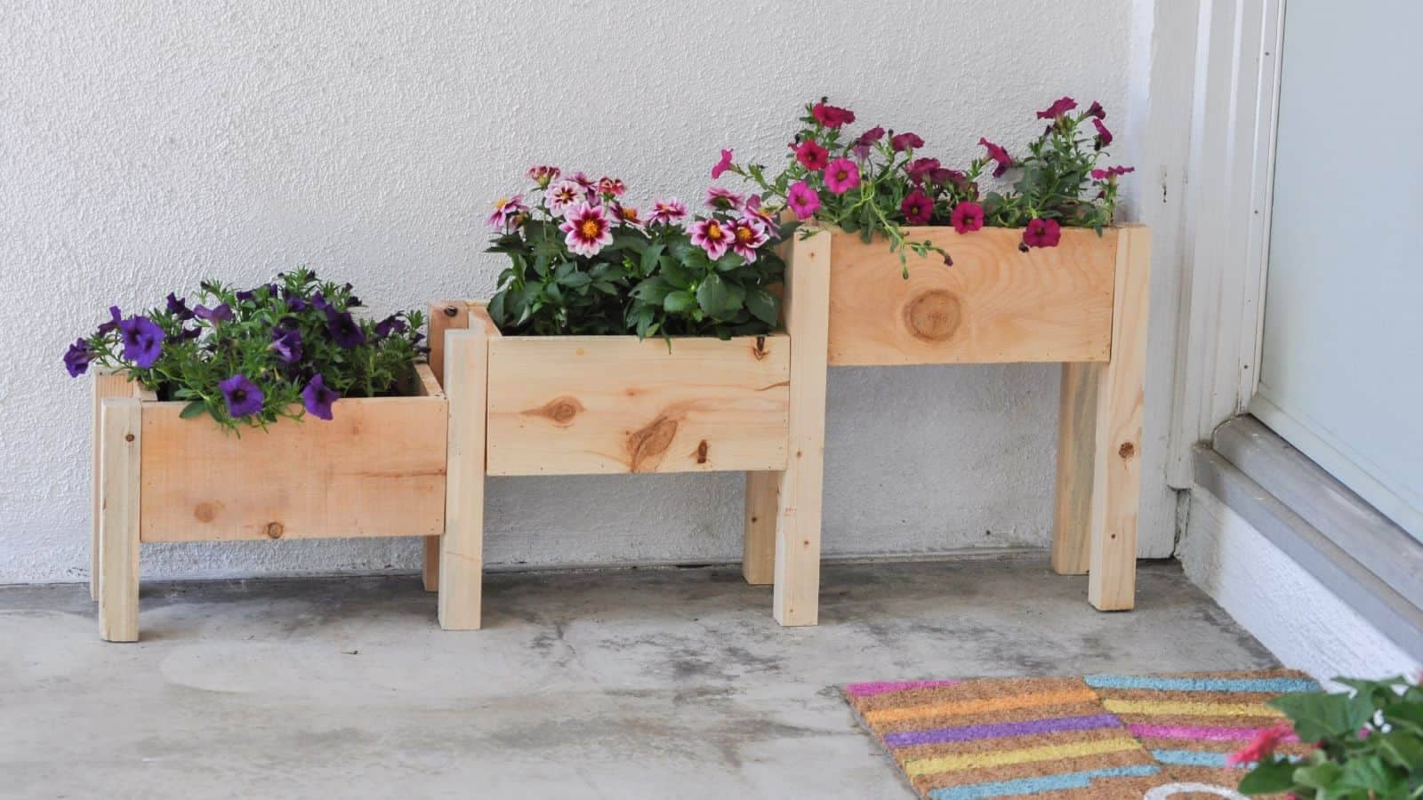 <p>This cute little planter is the perfect project to start your woodworking journey! It’s great to use on a front porch, patio, or deck. Change out the flowers each season for a colorful display. <a href="https://www.anikasdiylife.com/tiered-planter-box-plans-tutorial/">You only need a miter saw and a nail gun to make your own.</a></p>