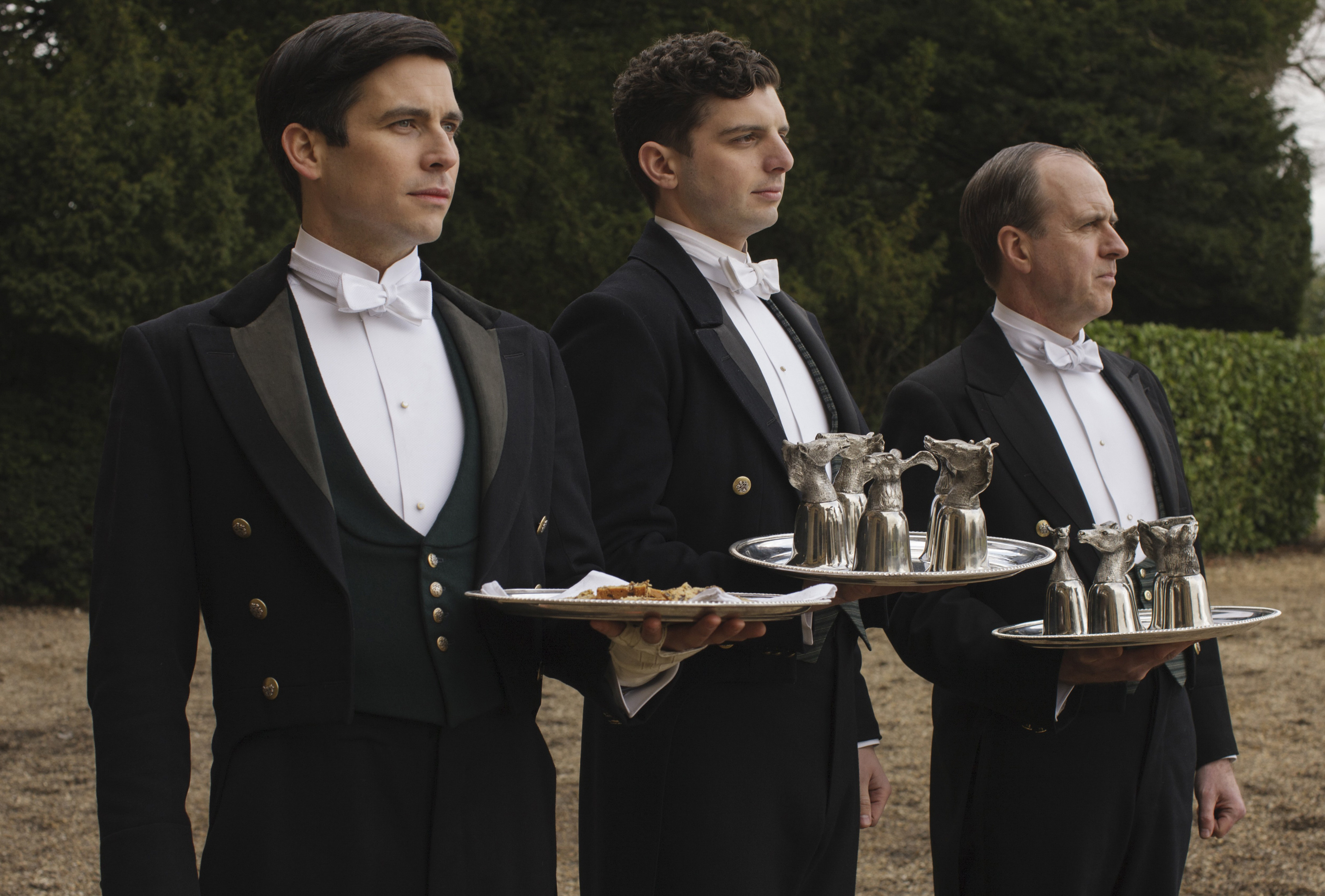 <p>While it's clear the footmen's uniforms are pressed and starched to perfection, the details are there too. Season 5 and 6 "Downton Abbey" costume designer Anna Mary Scott Robbins, who also worked on the movie, told <a href="https://www.vogue.co.uk/article/downton-abbey-film-costumes-anna-jones-interview">Vogue</a> that she made sure the buttons on the livery were stamped with the Grantham family coat of arms, delivering an extra dose of authenticity.</p>