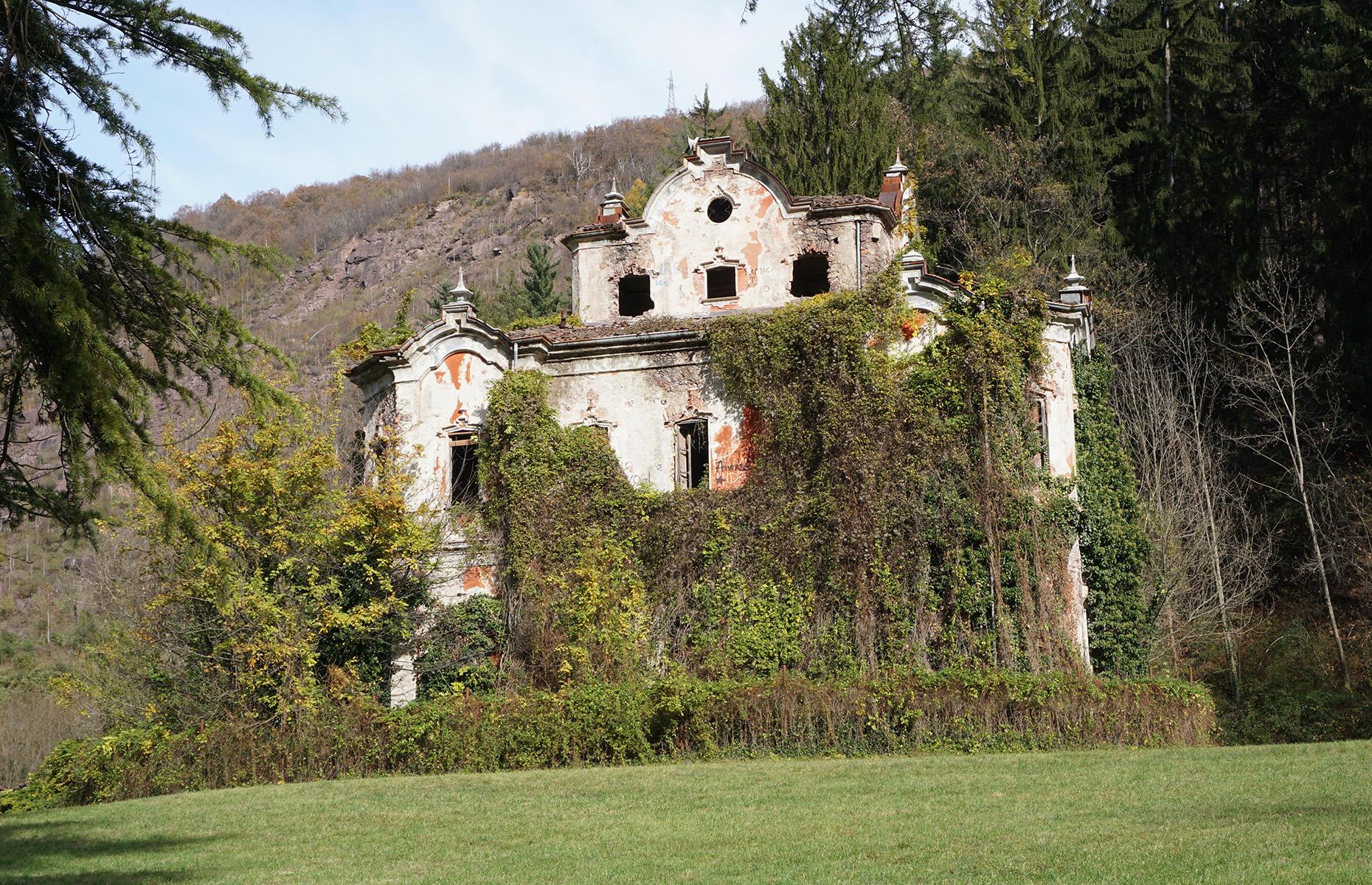 <p>Rumoured to be haunted, this magnificent stately home situated just east of Lake Como was built between 1854-1857 as the summer residence of Count Felix De Vecchi.</p>  <p>However, Villa De Vecchi, or the Red House as the property is alternately known, only survived a few short years before a string of tragedies led to its decline.</p>
