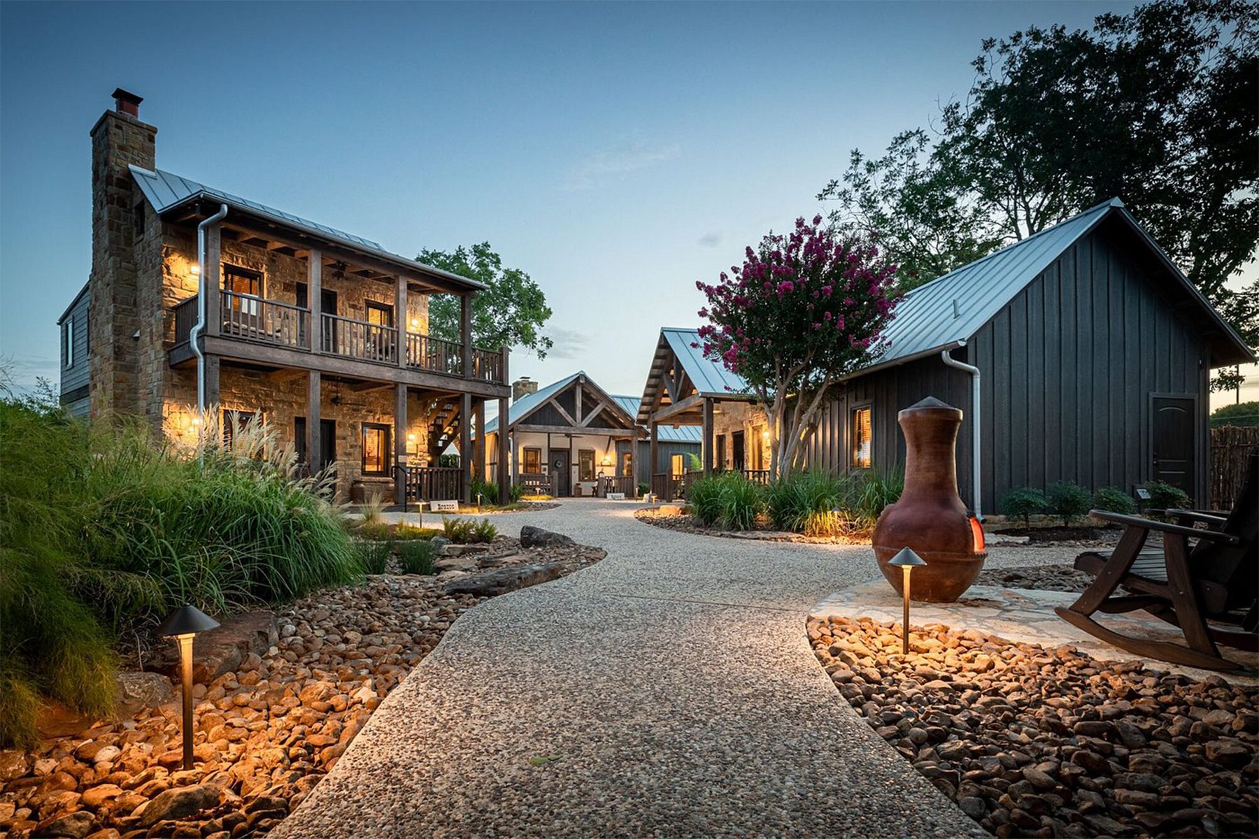 <h3 class="">Fredericksburg, Texas</h3> <p class=""><strong>Best for:</strong> A culinary adventure for couples in Texas Wine Country</p> <p>If you're looking for an adventure with a bit of Southern history, rustic cabins with modern amenities and what one guest described as a "Little House on the Prairie" stay, then <a href="https://www.tripadvisor.com/Hotel_Review-g55863-d543027-Reviews-Cotton_Gin_Village-Fredericksburg_Texas.html" rel="noopener">Cotton Gin Village</a> is the bed-and-breakfast for you. Located in <a href="https://www.rd.com/list/texas-road-trips/">historic Fredericksburg</a> in Texas Hill Country (and Texas wine country), the seven cabins on the property are like stepping back into pioneer days gone by, with original 1800s log structures that were handcrafted and relocated from Tennessee and Kentucky.</p> <p>Both the seven original log cabins and seven newly constructed cottages, built in the style of a Texas Hill Country German Fachwerk (or building), feature rustic furnishings and plush beds, wine chillers, Keurig makers, fireplaces, HD televisions and other upscale amenities. Outdoors, guests will find walking paths with ivy-covered walls, Koi ponds and waterfalls, and homey country-inspired decor like rocking chairs, chimineas and empty whiskey barrels.</p> <p>In the morning, a hot breakfast is delivered in a handmade Amish basket to both the cabins and cottages. There is also an on-site restaurant, Cabernet Grill, that serves Texas Hill Country cuisine paired with local wines. Guests who have stayed at the property love the peaceful accommodations, indulgent breakfasts and delightful dinners.</p> <p><strong>Pros:</strong></p> <ul> <li class="">A unique setting for a quiet adult getaway</li> <li class="">Highly acclaimed restaurant on the property</li> </ul> <p><strong>Cons:</strong></p> <ul> <li class="">Only service dogs are allowed</li> <li class="">Located 2.5 miles from Main Street, so you'll need a car to head into town</li> </ul> <p class="listicle-page__cta-button-shop"><a class="shop-btn" href="https://www.tripadvisor.com/Hotel_Review-g55863-d543027-Reviews-Cotton_Gin_Village-Fredericksburg_Texas.html">Book Now</a></p>