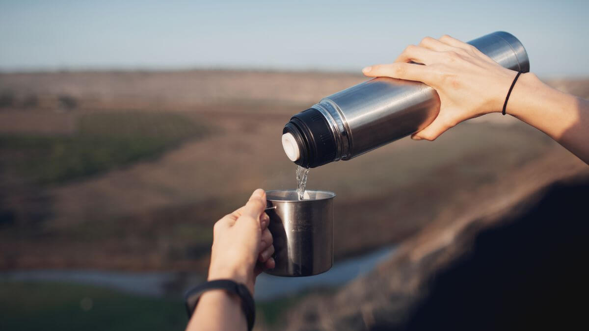 <p>Aside from staying full, you must also stay hydrated. </p><p>The problem is that establishments along the road often charge much for bottled water. So fill reusable jugs or lidded cups with cold water before setting out. Stainless steel containers are great for keeping your beverages chilled.</p><p>Some camping grounds also offer potable water for free, extending your savings (and reducing plastic waste while you’re at it). </p>