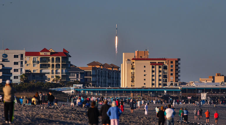 Launch of a SpaceX Falcon 9 rocket on a national security mission for the Space Force. The rocket launched at 5:30 p.m. EST Wednesday, February 14th from Launch Complex 40 at Cape Canaveral Space Force Station. The booster returned to CCSFS after launch. People on the beach in Cocoa Beach watched the launch and booster landing.