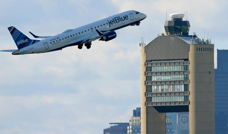 BOSTON, MA - February 10: A plane takes off at Logan Airport on February 10, 2023 in Boston, Massachusetts