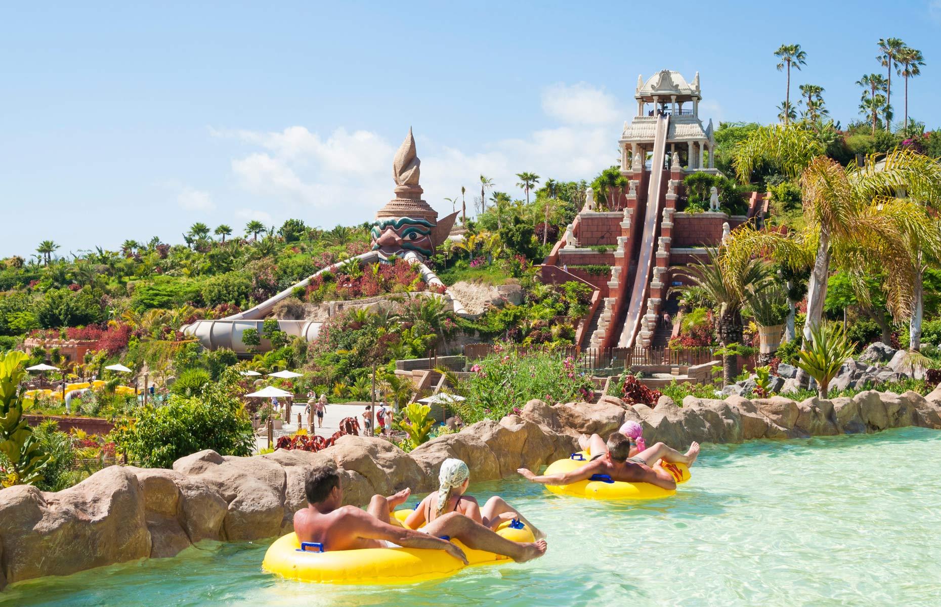 <p>This Thailand-themed attraction in Tenerife has often been named among the world's best waterparks by Tripadvisor, and for good reason. Top attractions are the Tower of Power, where riders can reach speeds of around 50 miles per hour (80km/h) as they swoop down the 90-foot-high (28m) slide into an aquarium filled with stingrays and sharks. Tackle the Mekong Rapids on a giant inflatable with your mates or dare them to take on the Dragon, a totally vertical funnel. Recover on Siam Beach.</p>
