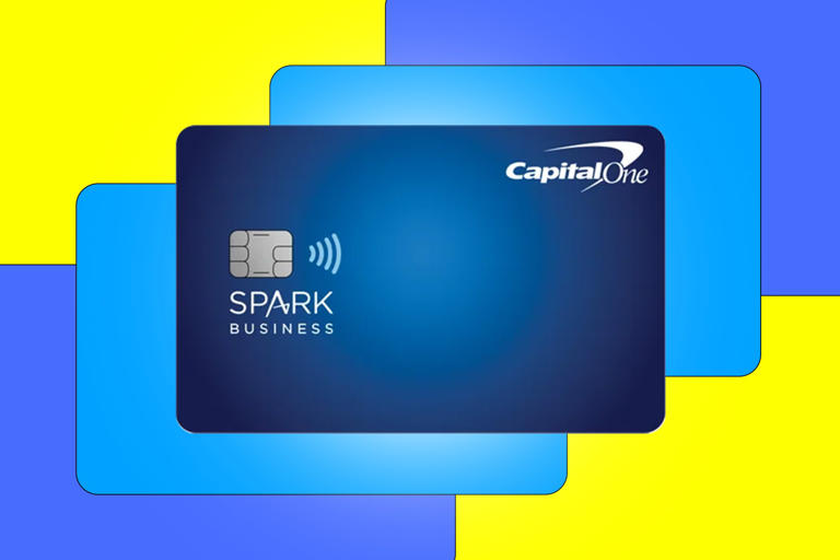 Photo of Capital One Spark Miles for Business Card on a blue and yellow abstract background