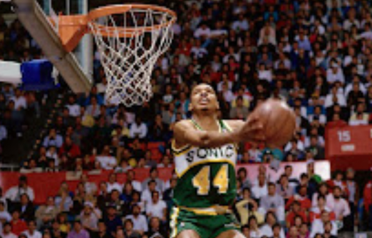 <p>Terence Stansbury's "Statue of Liberty" Dunk (1987): Terence Stansbury immortalized himself with a "Statue of Liberty" dunk, captivating fans with his smooth execution and flair, cementing his legacy as one of the most electrifying dunkers of his time.</p>