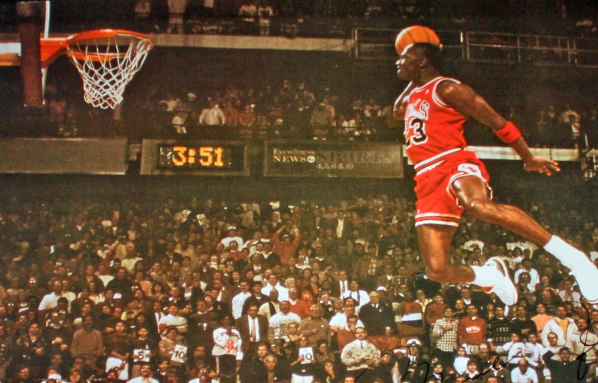 <p>Michael Jordan leaped from the free-throw line, soaring through the air with elegance and precision before slamming the ball through the hoop, capturing the imagination of fans worldwide.</p>