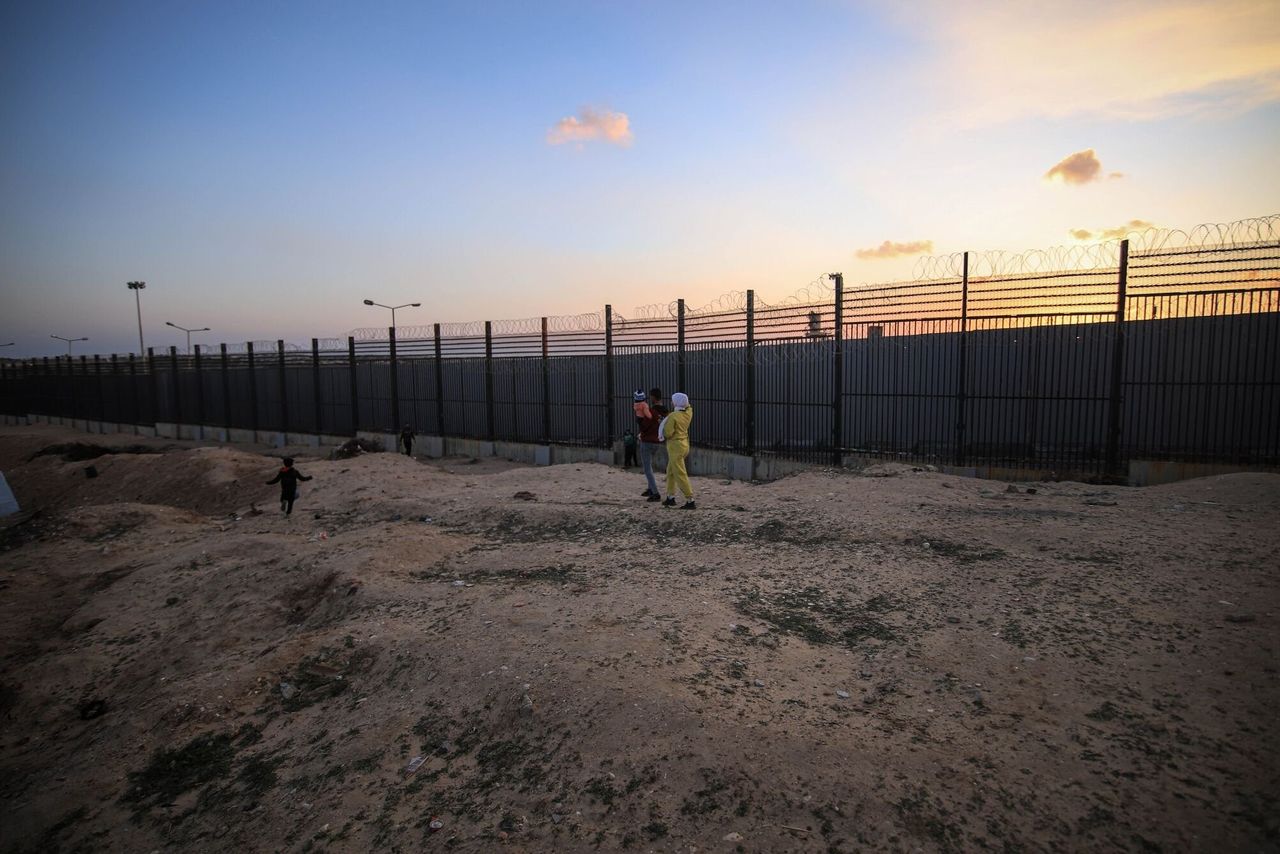 egypt builds walled enclosure on border as israeli offensive looms