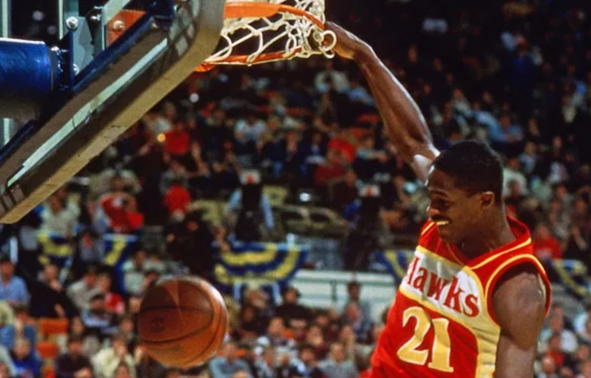 <p>Dominique Wilkins showcased his raw power and athleticism with a jaw-dropping two-handed windmill dunk, electrifying the crowd and solidifying his status as a dunking legend.</p>