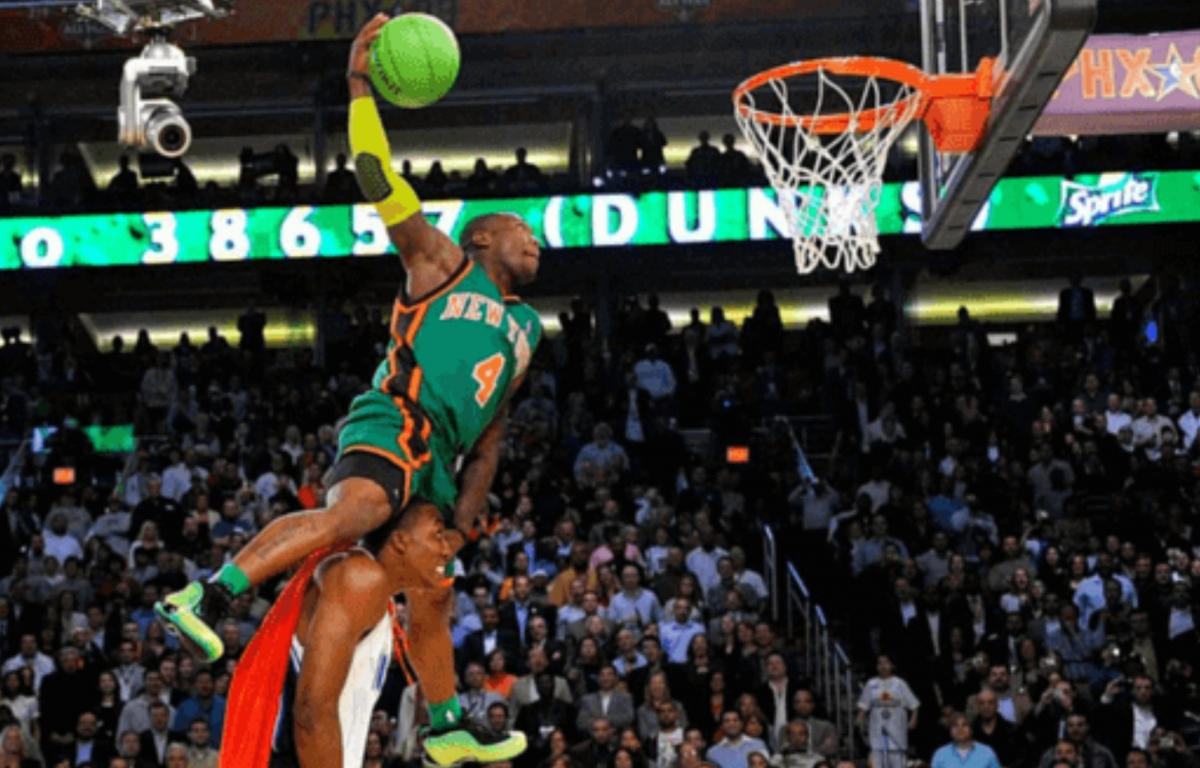 <p>Nate Robinson showcased his boundless energy and creativity by soaring over Dwight Howard for a jaw-dropping dunk while dressed as "Krypto-Nate", securing his place in dunk contest history.</p>