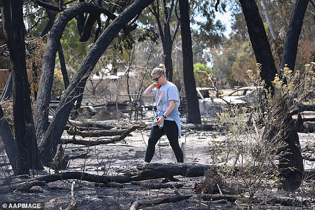 Farmer's chilling final photo hours before tragedy struck: Victoria reels  from storms and bushfires as a