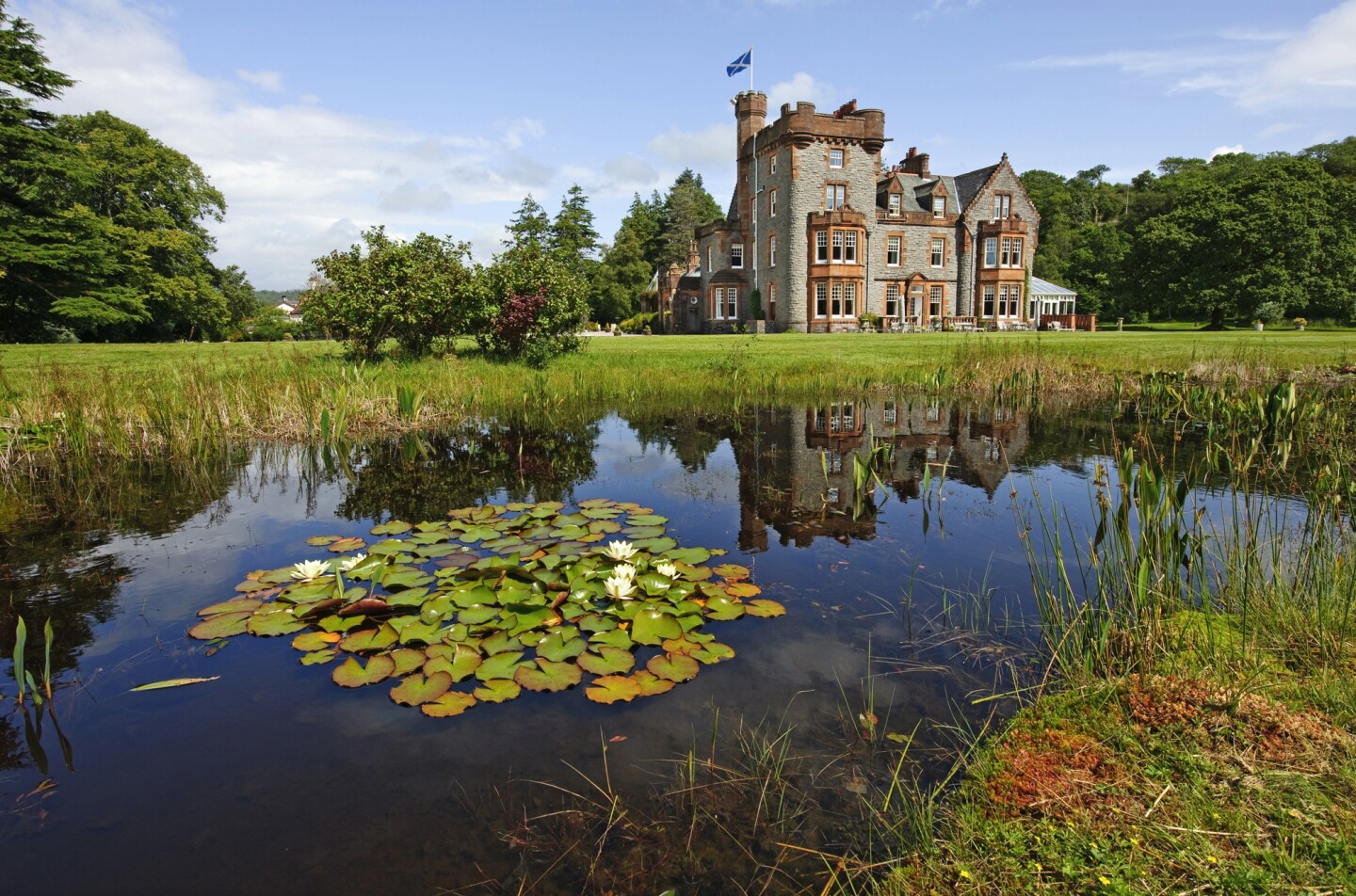 <h2>Isle of Eriska, Scotland</h2> <ul>   <li><b>Location: </b>Loch Creran, Scotland </li>   <li><b>Why we love it: </b>Wildlife including roe deer and otters, whisky and gin tasting, many outdoor activities</li>   <li><a class="Link" href="https://www.eriska-hotel.co.uk" rel="noopener"><b>Book now</b></a> </li>  </ul> <p>On the Isle of Eriska, a 365-acre private island with a hotel and spa, you’re a 30-minute drive from seaside Oban, but the area feels much more remote, surrounded by the wild beauty of Scottish lakes and mountains with abundant wildlife, including roe deer, seals, otters, golden eagles, and badgers. Step into a pair of Wellingtons (they keep them by the front door) and explore the grounds on foot, or choose to linger over the whisky menu in the main house. The guest rooms and suites are delightfully mismatched, each drawing on the unique architecture of the space, but there are also plenty of options for groups of different sizes, including spa and garden cottages hidden in the historic stables and the six-person Arnott’s House. While on the property, you can take part in such activities as archery, axe-throwing, falconry, beekeeping, fishing, golfing, and much more. </p>